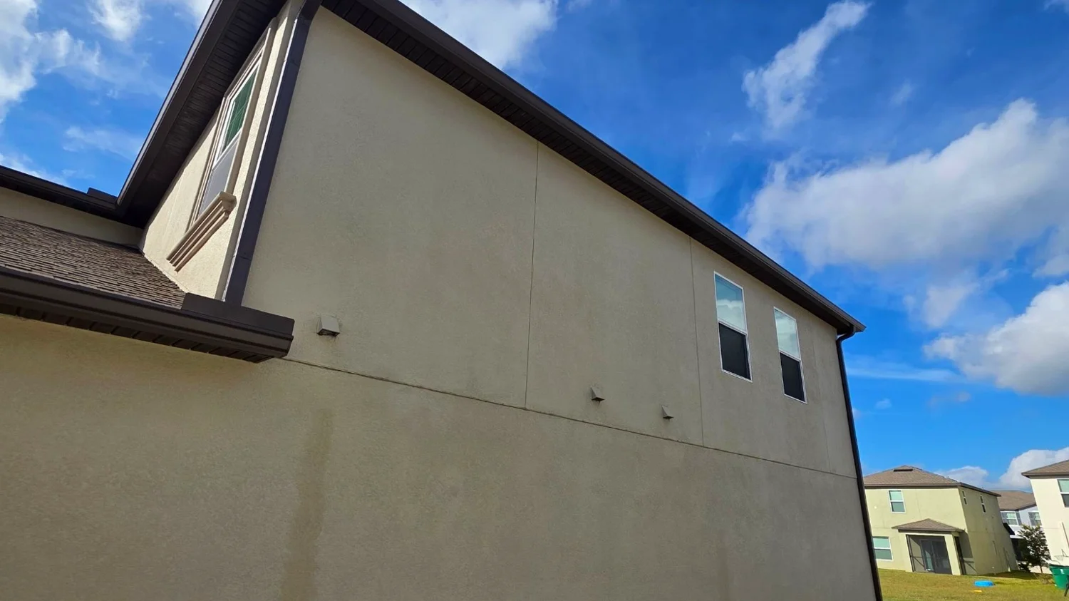 Gutter installation on a screened patio near Boynton Beach