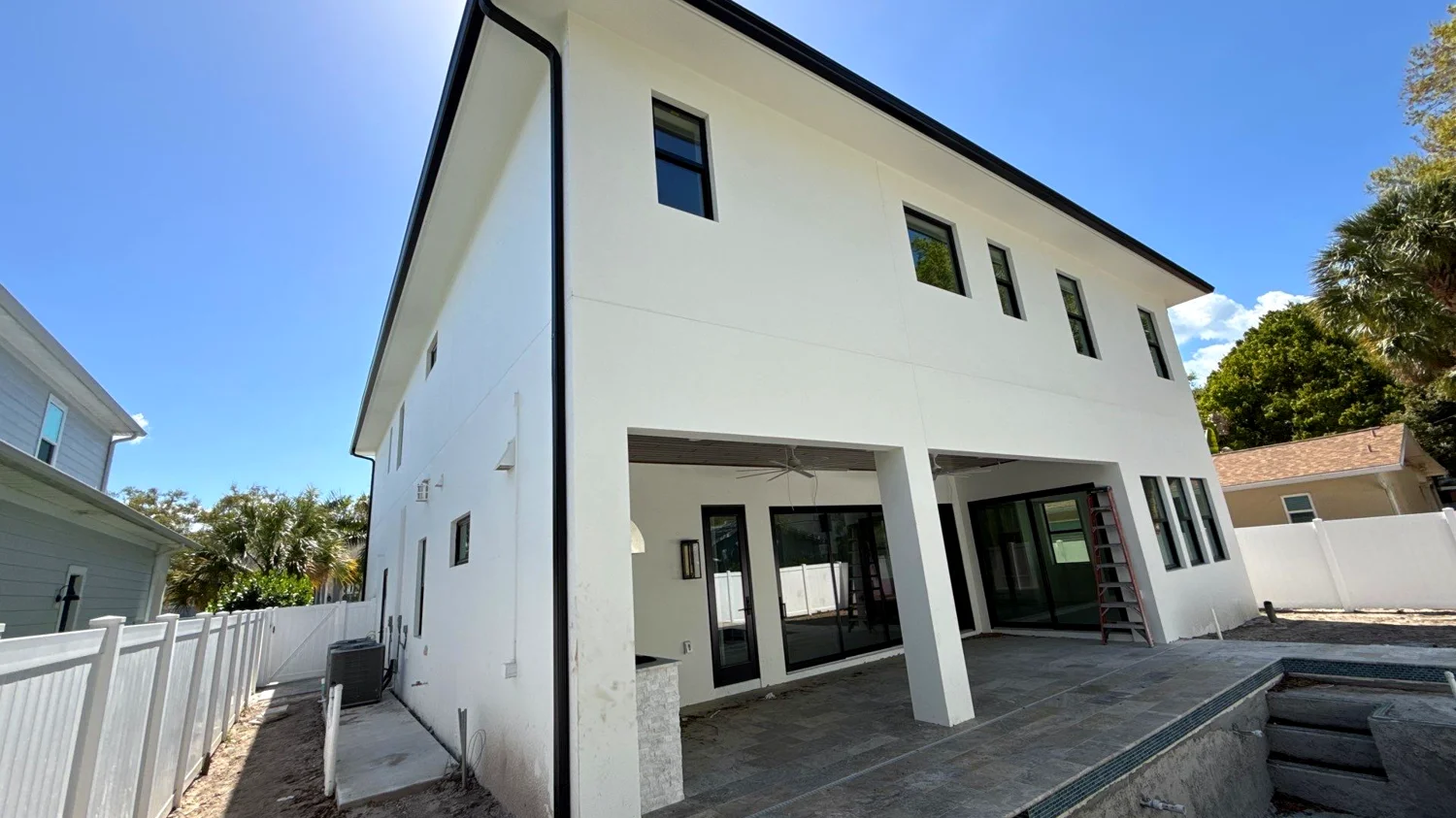 Black gutters on a modern Boca Raton home