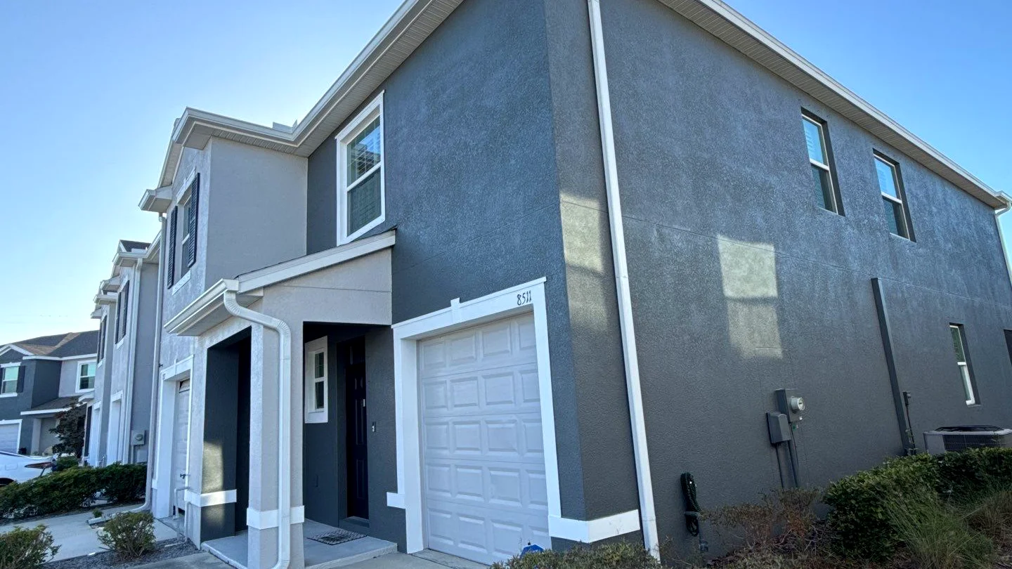 Gutter installation on a Boynton Beach townhome