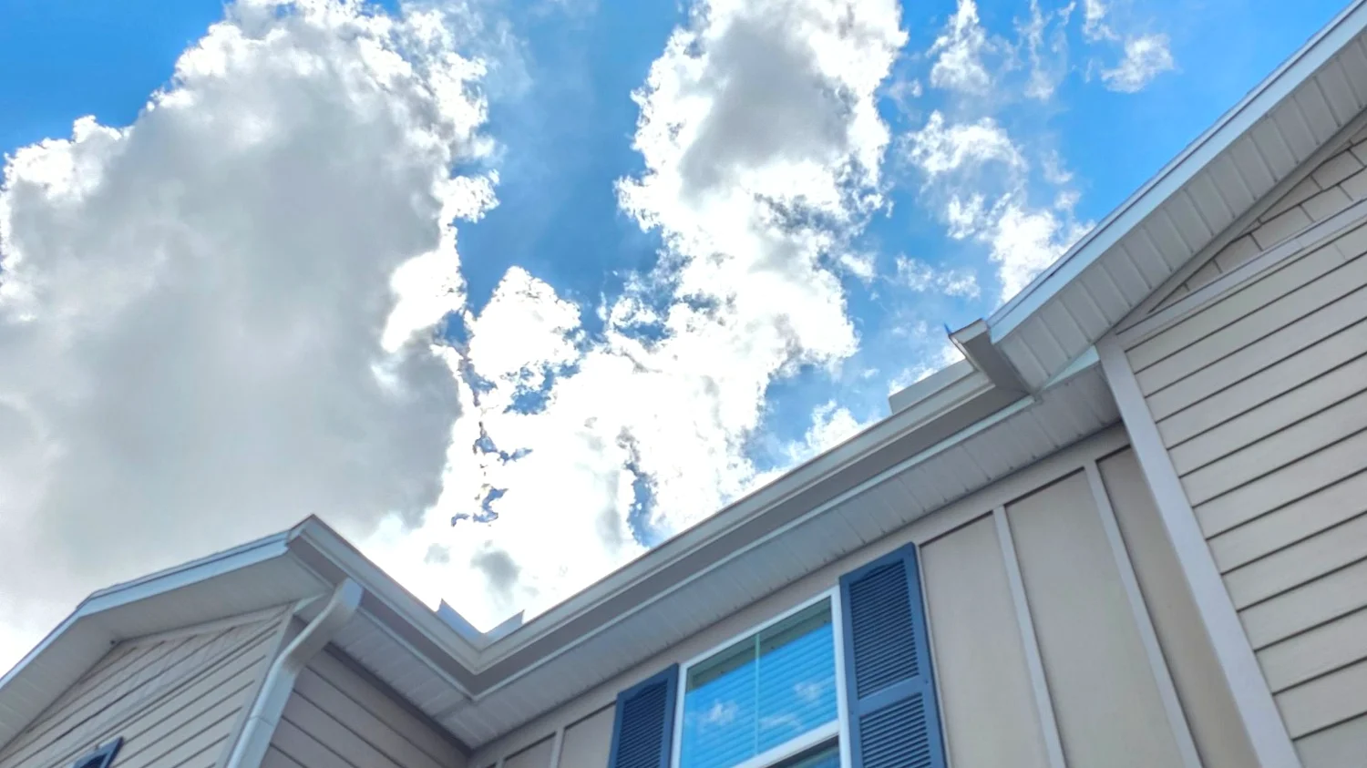 Second-story gutter installation in Deerfield Beach