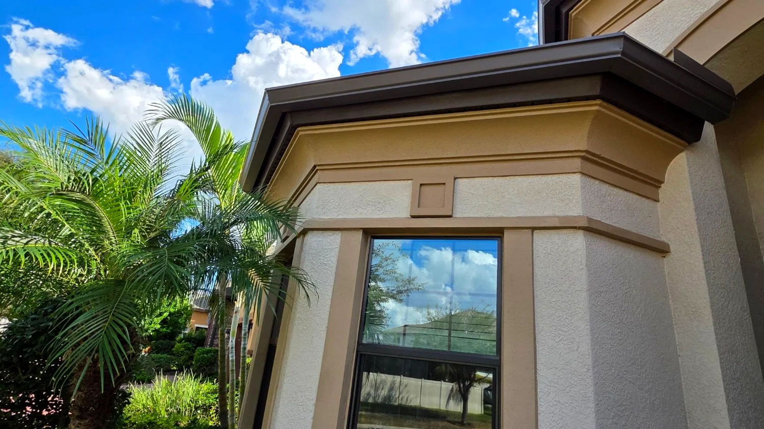 Bay window gutter system on a Lighthouse Point home