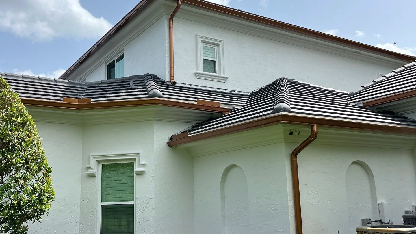 Copper gutter installation on a South Florida home